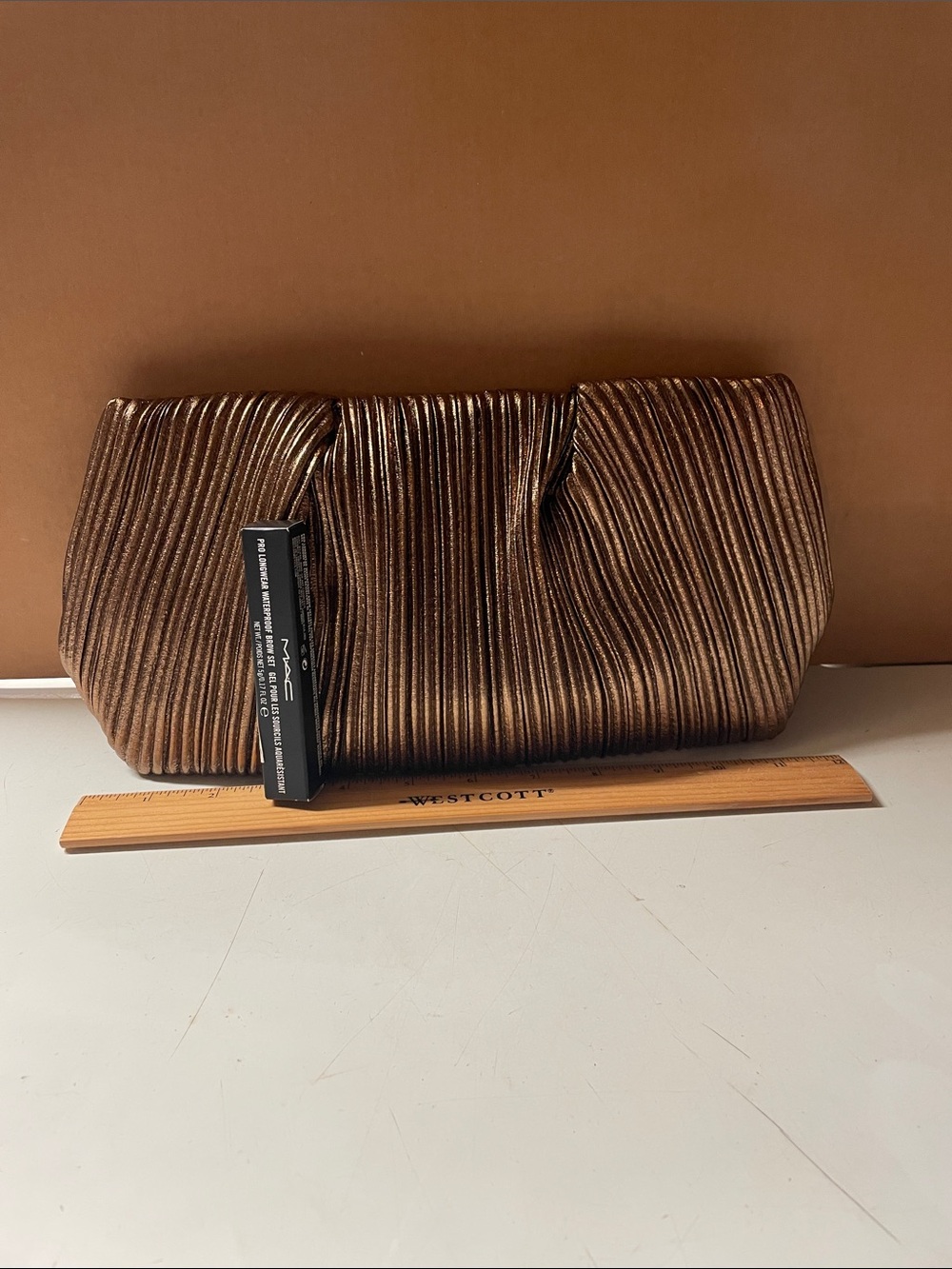 Bronze Metallic Pleated Clutch Handbag.